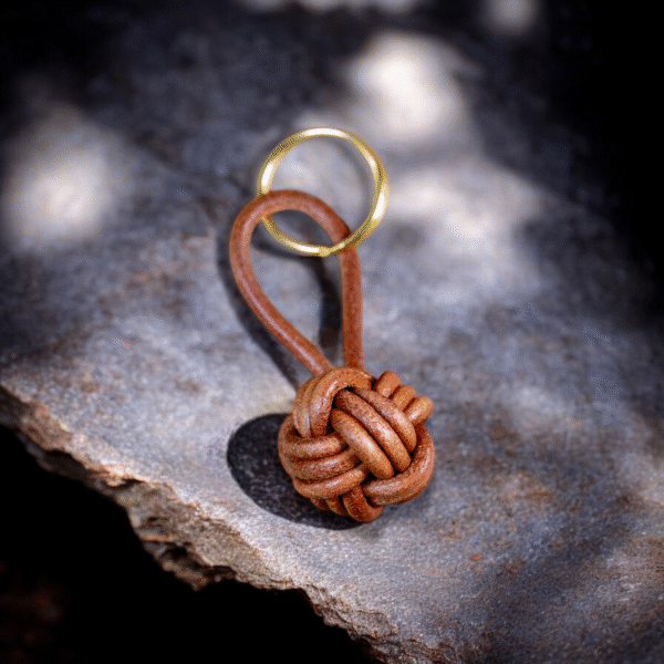Premium brown leather monkey fist keychain, handcrafted with top-grain cow leather and a solid brass keyring.
