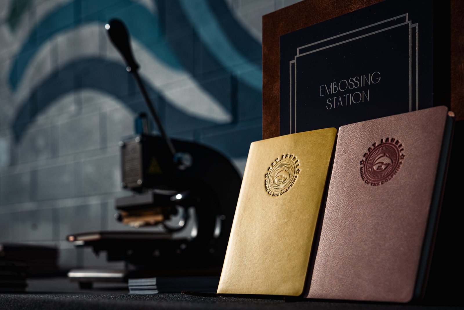 Onsite debossing station at Bay Laurel School Dance in Calabasas, personalized faux leather notebooks with custom stamp debossing for students and parents.