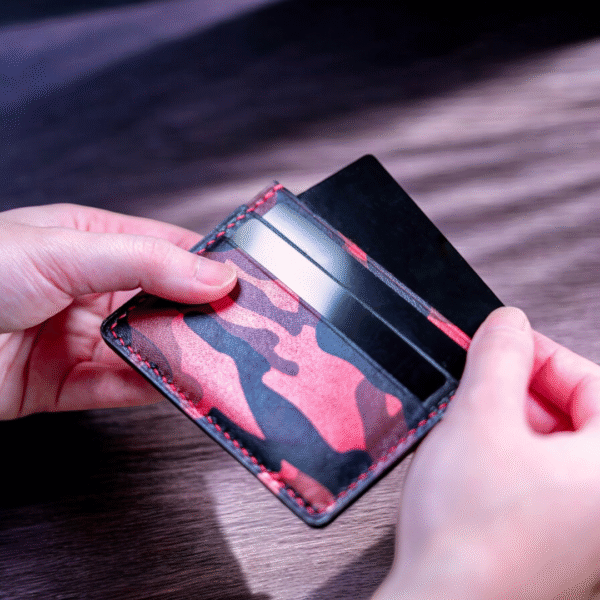 Back view of Bold Red Camouflage cardholder, handcrafted with full-grain goat leather, showcasing its clean and durable design.