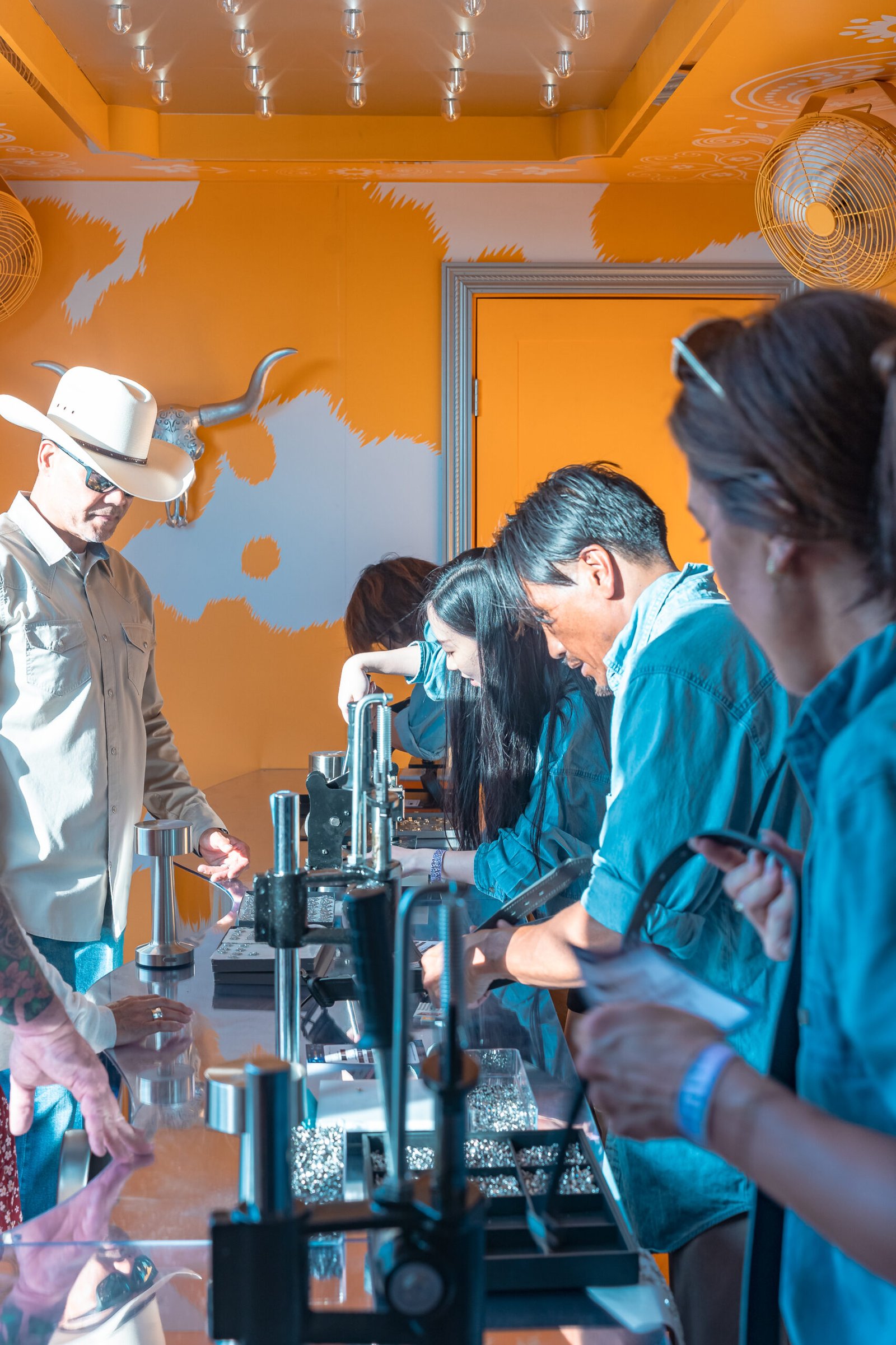 Gold foil embossed leather luggage tags for Fora Travel at Create & Cultivate Festival 2025 in DTLA