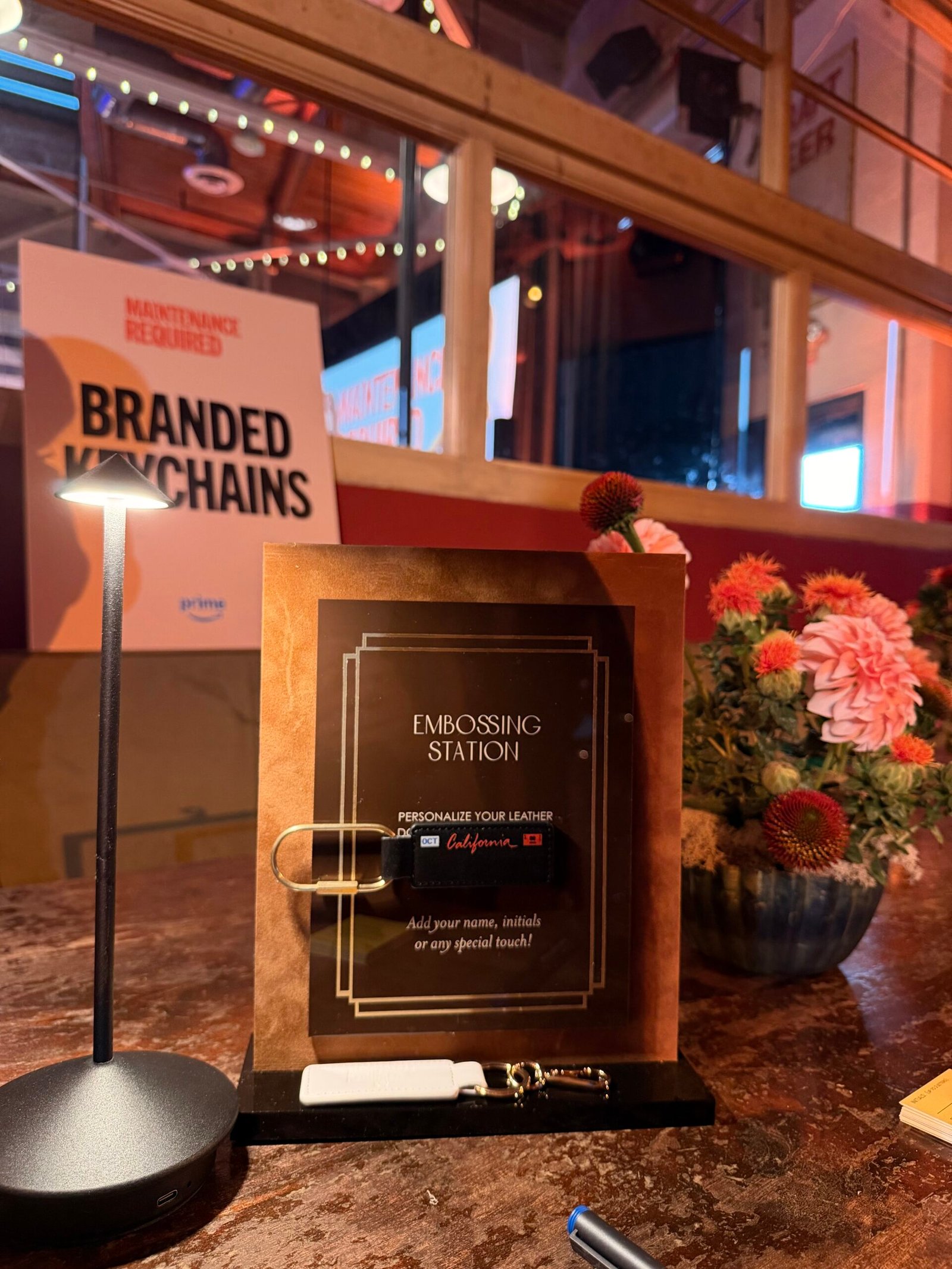 Embossing Station Sign Gold foil embossed leather luggage tags for Fora Travel at Create & Cultivate Festival 2025 in DTLA