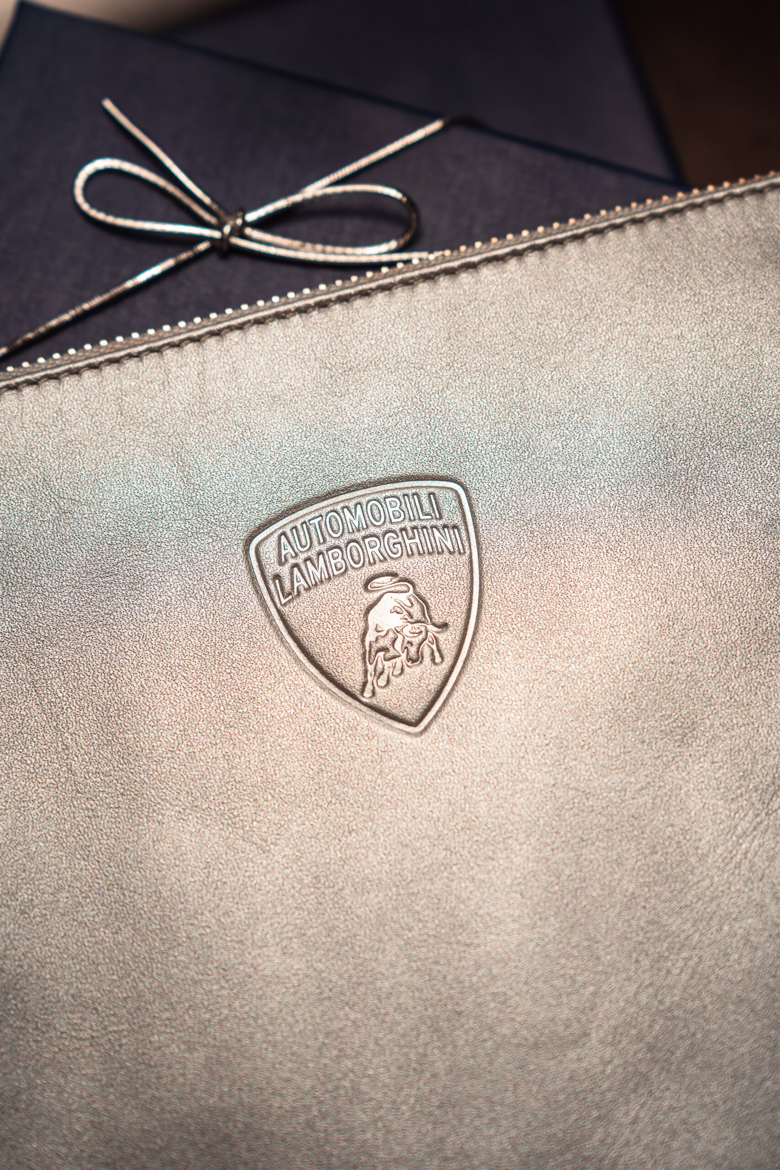 logo pre-stamping Walmart National Fashion Tour personalization station – western belts embossed with initials and rivet decorations under “Now Delivering Your Rodeo Dream” backdrop