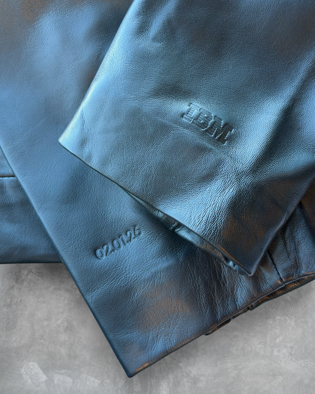 IBM Grammy Jacket Two influencers capturing photos and videos of the onsite embossing station at Prime Video’s Maintenance Required premiere.