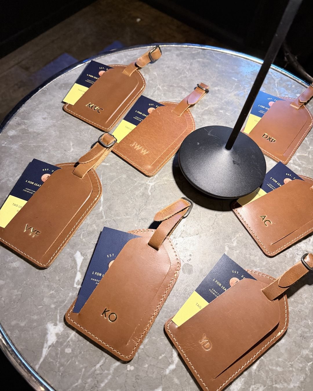 Prime Video CES Party Personalized Gifts Walmart National Fashion Tour personalization station – western belts embossed with initials and rivet decorations under “Now Delivering Your Rodeo Dream” backdrop